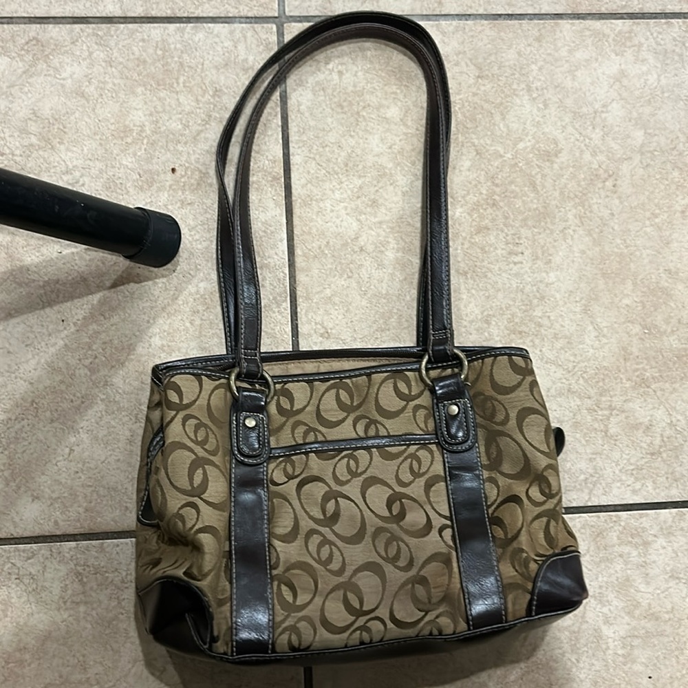 Used shoulder purse with few stains inside
